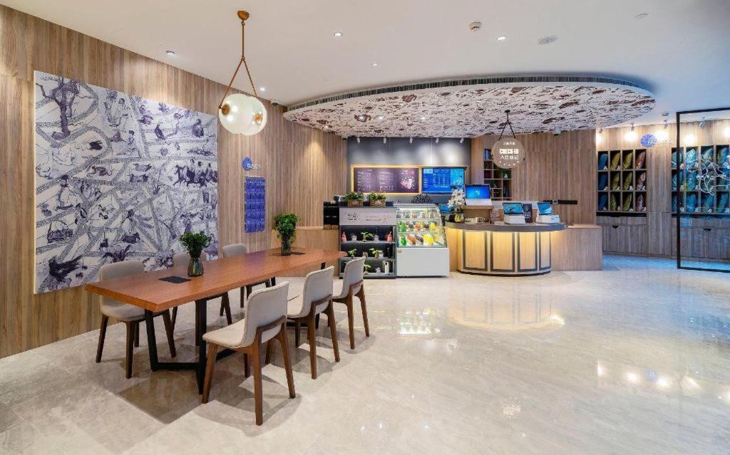 Hotel Hanting Premium Xinzhuang Longemont 3*